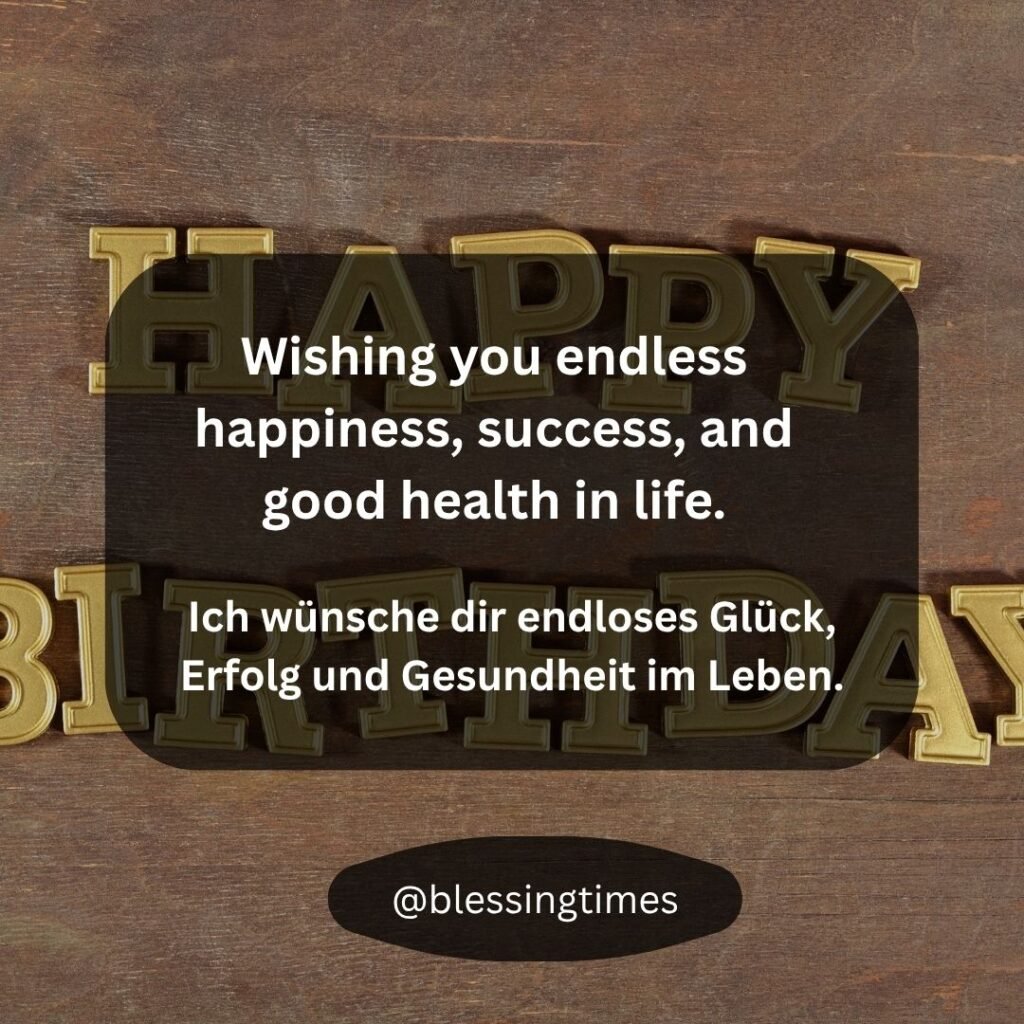 Gold and dark "HAPPY BIRTHDAY" letters are spread across a wooden background, overlaid with the English and German wish: "Wishing you endless happiness, success, and good health in life."